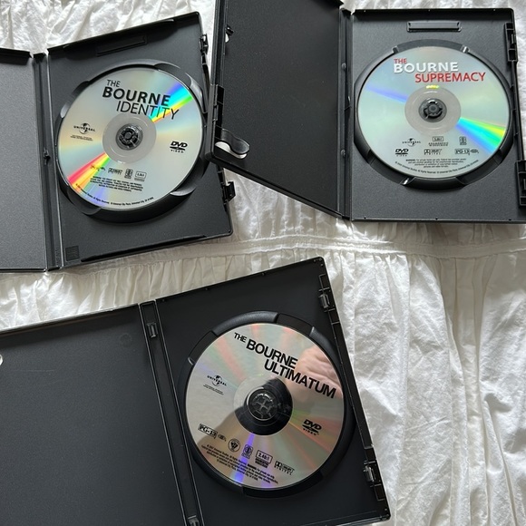 Jason Bourne DVD collection w bonus DVD. Like new. 4 DVDs total - Picture 11 of 11